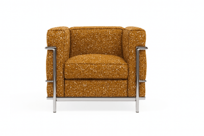 LC2 Petite armchair in modern mustard fabric, featuring a sleek chrome frame, perfect for mid-century modern decor.