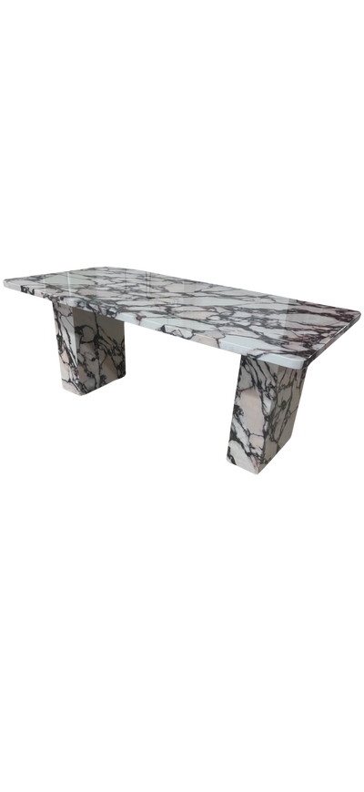 Calcutta faux marble dining table.